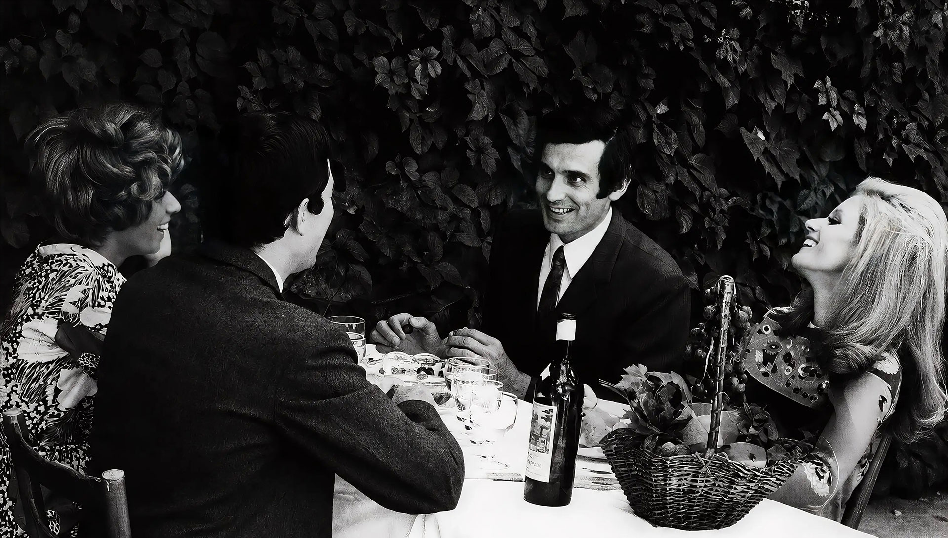 Guests dining together at a family table, Florence